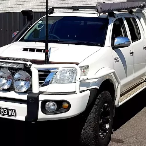 Toyota with Hilux upgrades outside Elite Tune's workshop