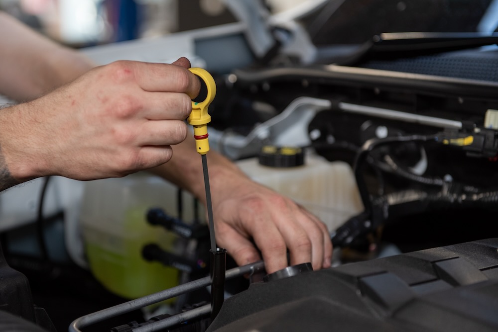 Mechanic doing a 4x4 service for a logbook