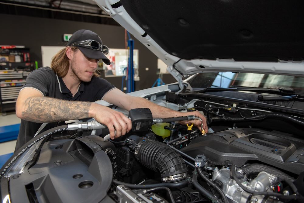 4x4 mechanic doing a log book service